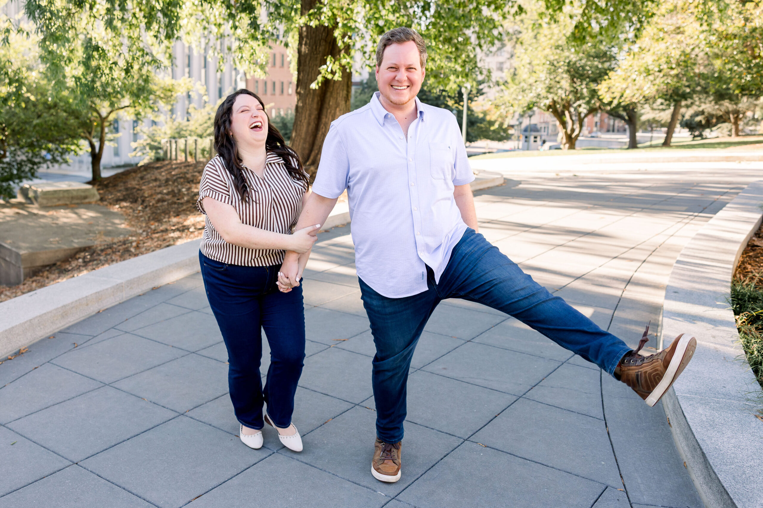 Couple laughing together during their engagement session